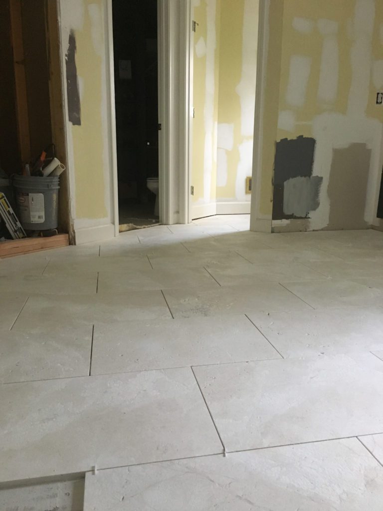 We Have Floors & a Crisis in the Master Bathroom!